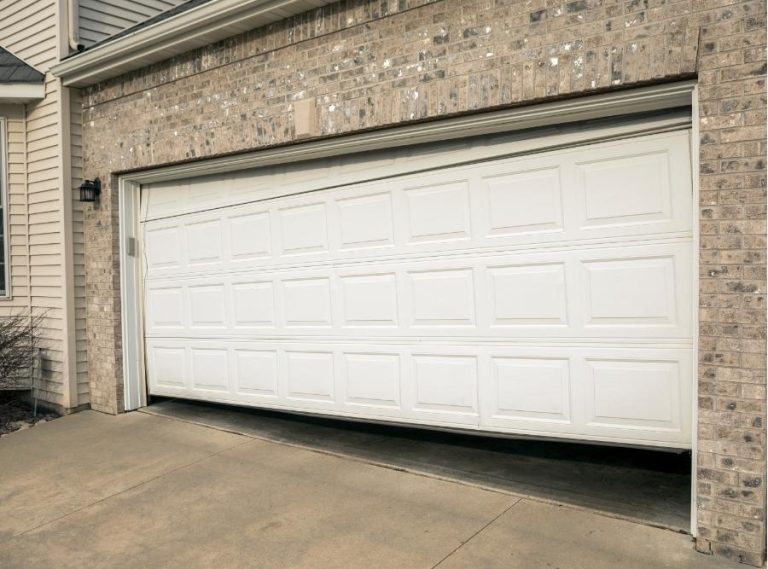 Garage door stuck halfway and not opening or closing in Roseville CA home – causes and repair solutions by St. Mary’s Garage Door Services