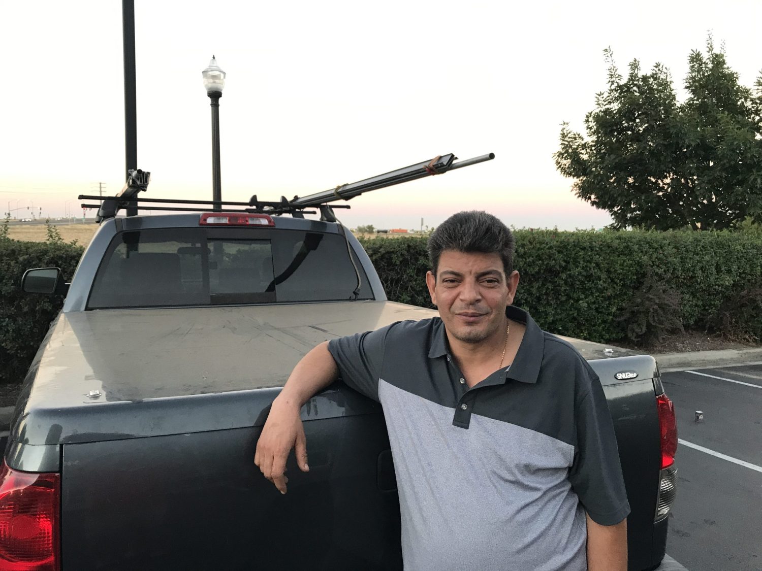 Basem, the founder of St. Mary's Garage Door Services, standing with his service truck in Roseville. He has been serving the local community since 2013.